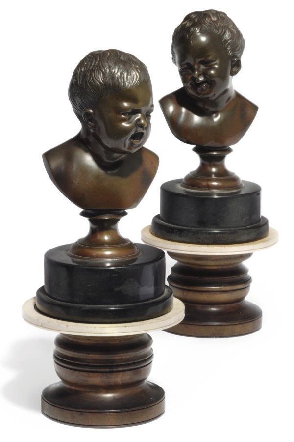 A PAIR OF FRENCH BRONZE BUSTS OF CHILDREN