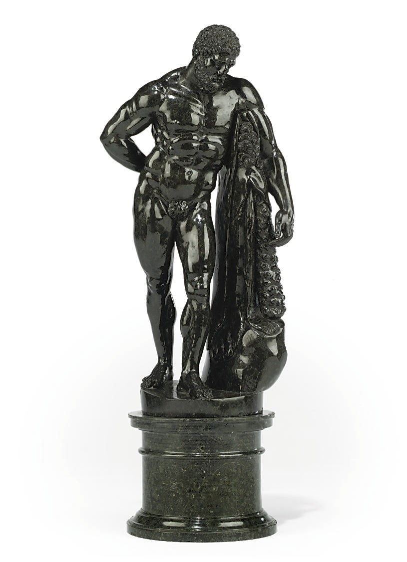 AN ITALIAN GREEN SERPENTINE MARBLE MODEL OF THE FARNESE HERCULES