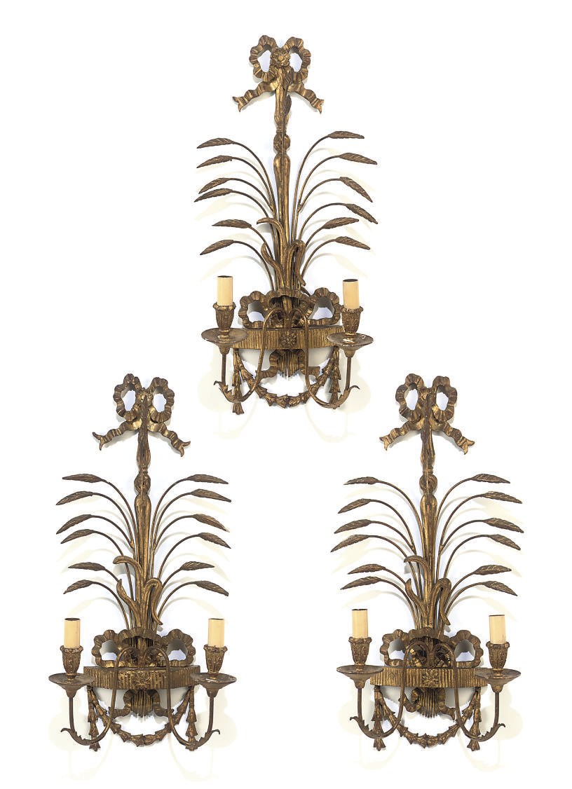 A SET OF THREE ITALIAN GILTWOOD WALL LIGHTS