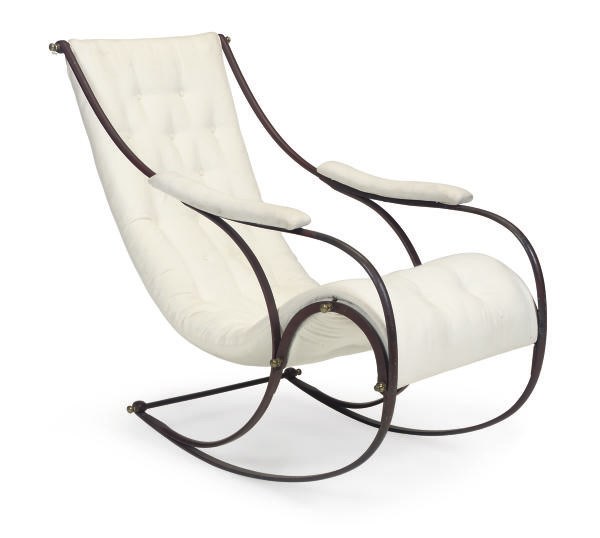 A VICTORIAN PAINTED CAST-IRON ROCKING CHAIR