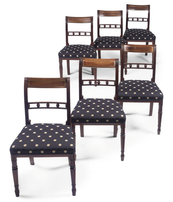 A SET OF SIX LATE REGENCY MAHOGANY DINING CHAIRS