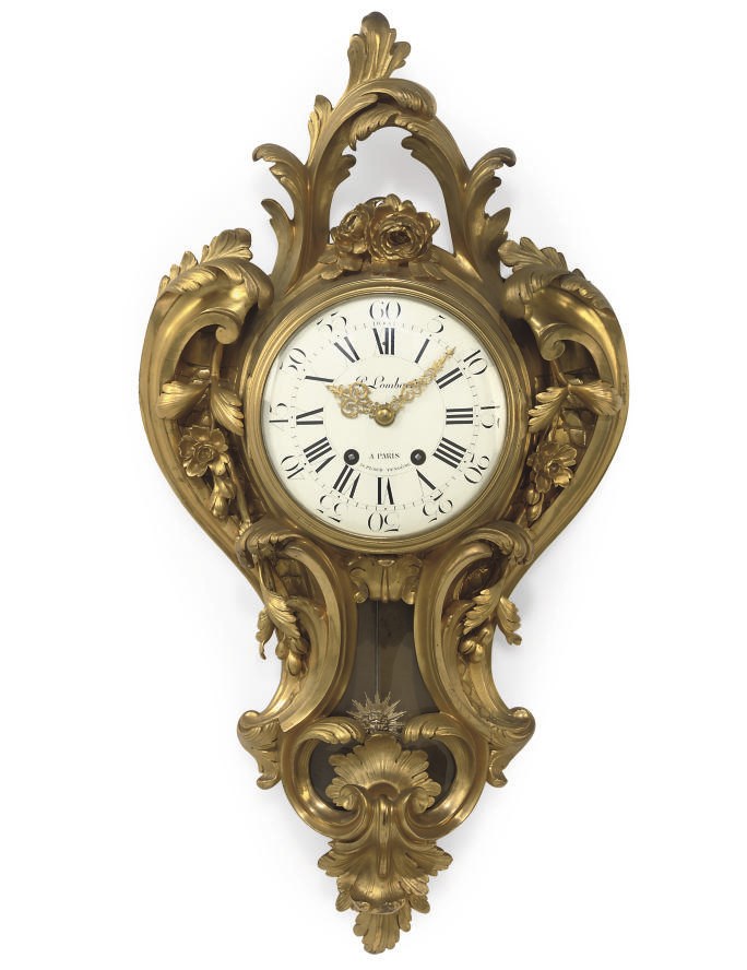 A FRENCH GILT-BRONZE CARTEL CLOCK
