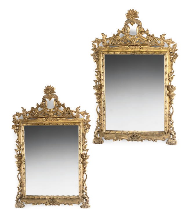 A PAIR OF CARVED GILTWOOD MIRRORS