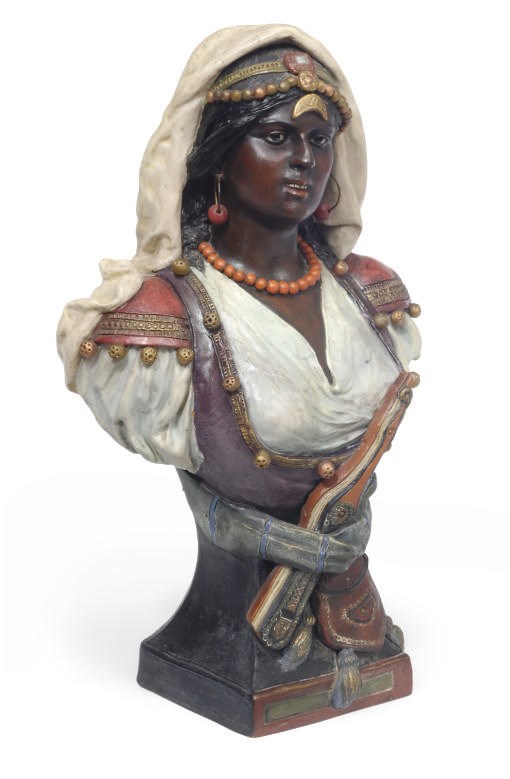 AN AUSTRIAN PAINTED TERRACOTTA BUST OF A NEAR EASTERN MAIDEN