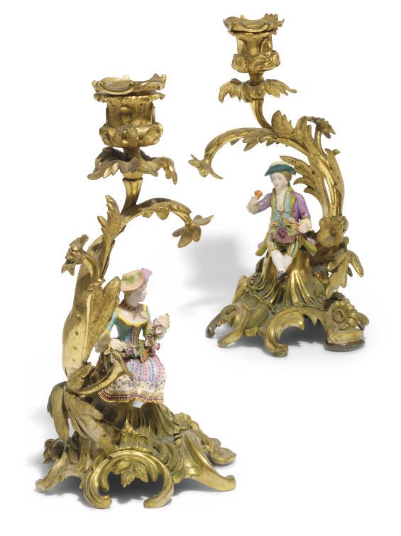 A PAIR OF CONTINENTAL GILT BRONZE AND PORCELAIN CANDELABRA