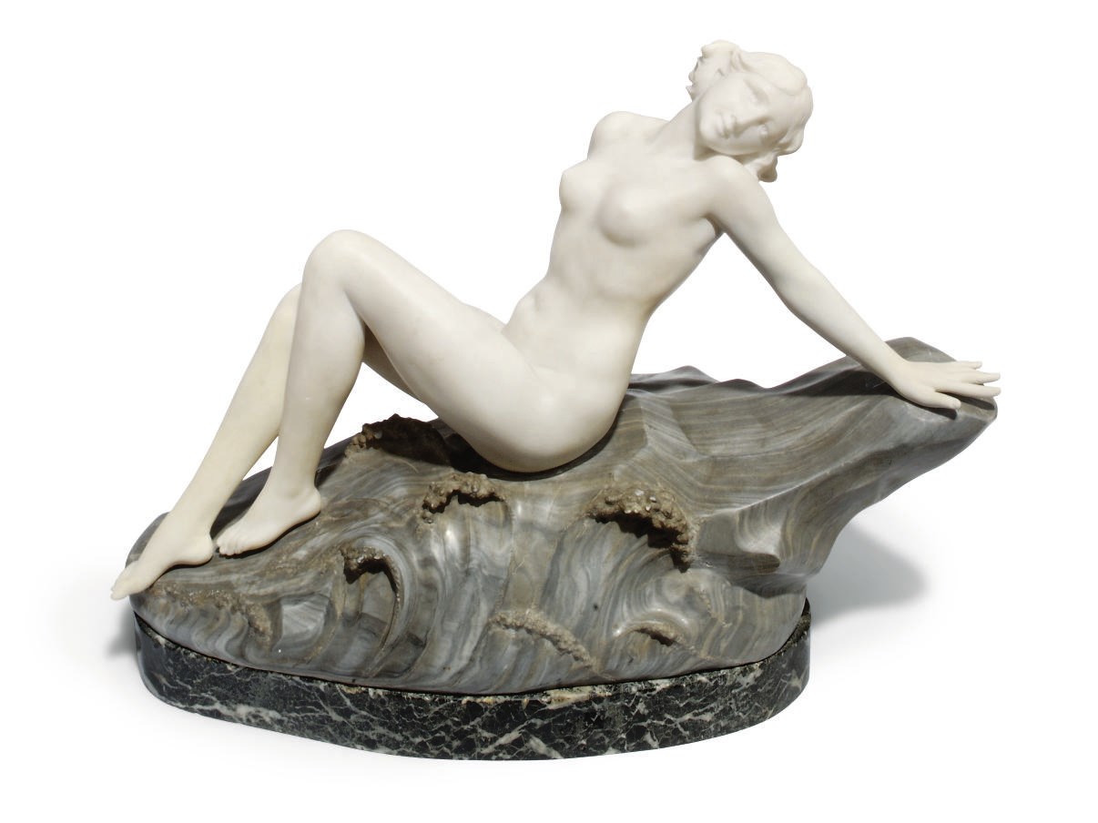 AN ITALIAN WHITE MARBLE FIGURE OF A BATHING NYMPH