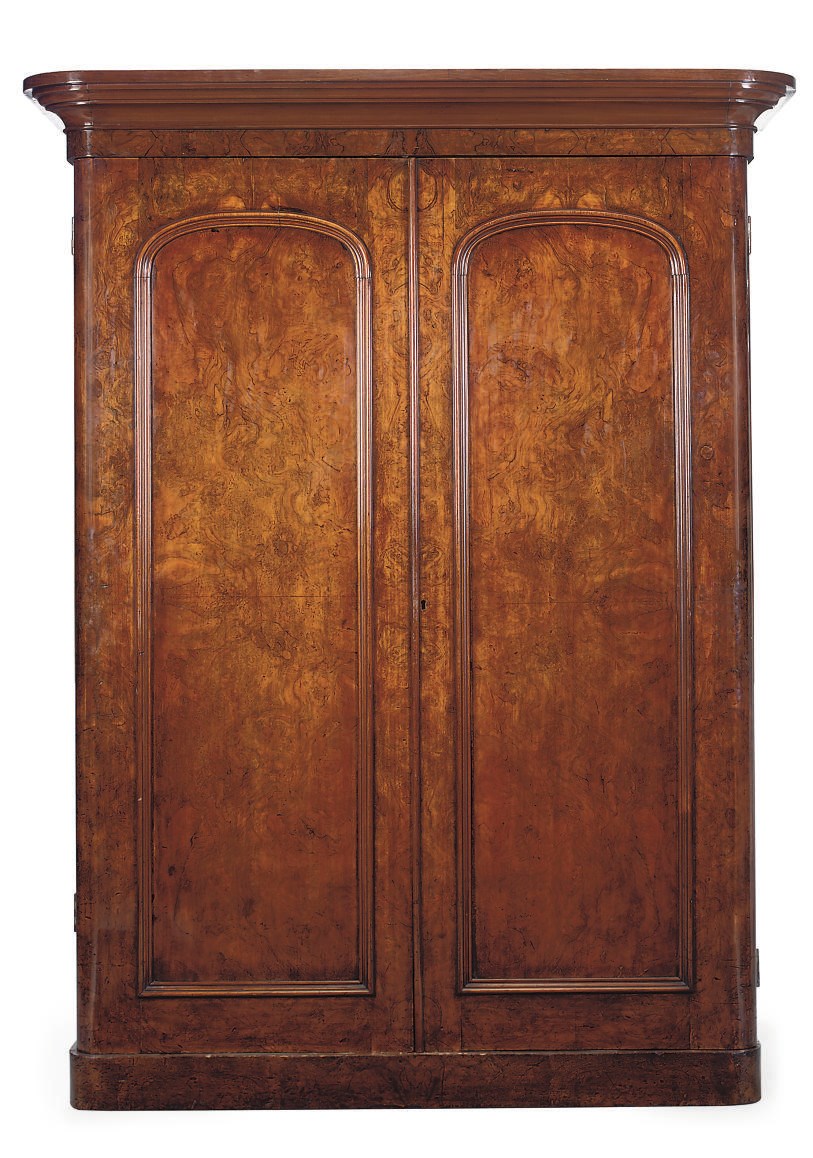 A VICTORIAN FIGURED WALNUT TWO DOOR WARDROBE