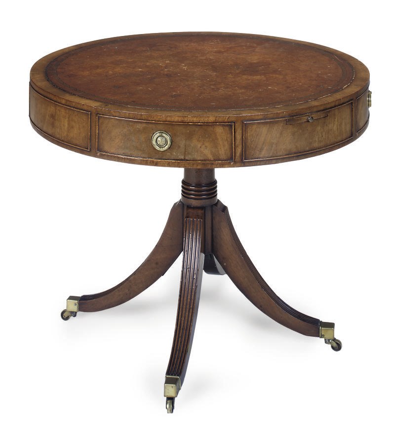 A MAHOGANY DRUM TABLE
