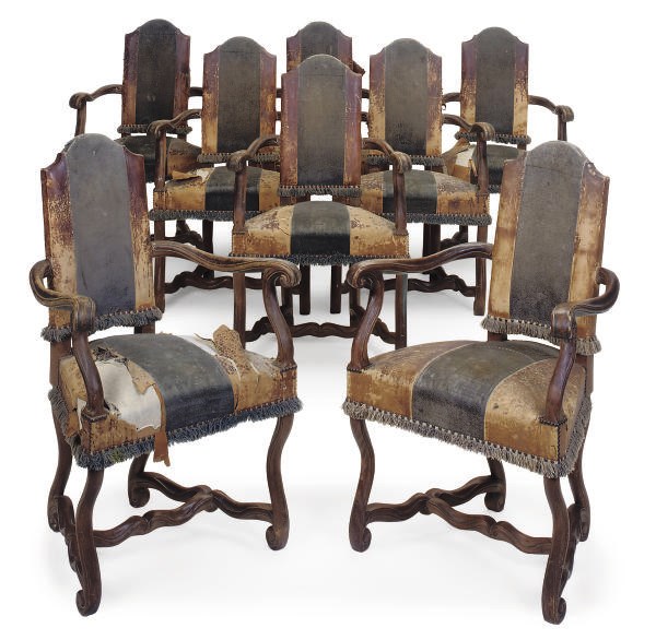 A SET OF EIGHT OAK DINING CHAIRS