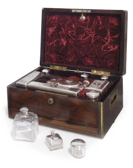 A WILLIAM IV SILVER MOUNTED GENTLEMAN'S TRAVELING DRESSING TABLE SET