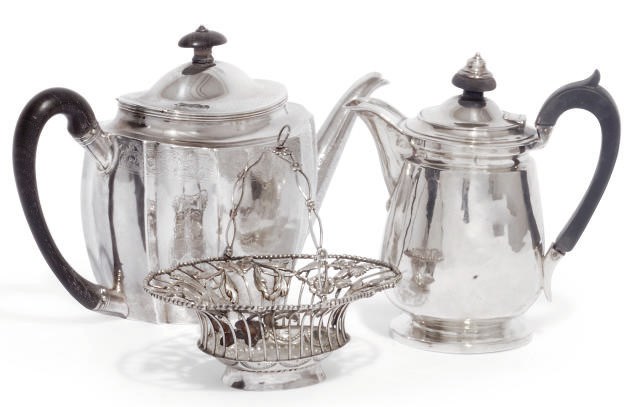 A GEORGE III SHAPED OVAL SILVER TEAPOT