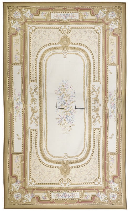 A FINE NEEDLEPOINT CARPET