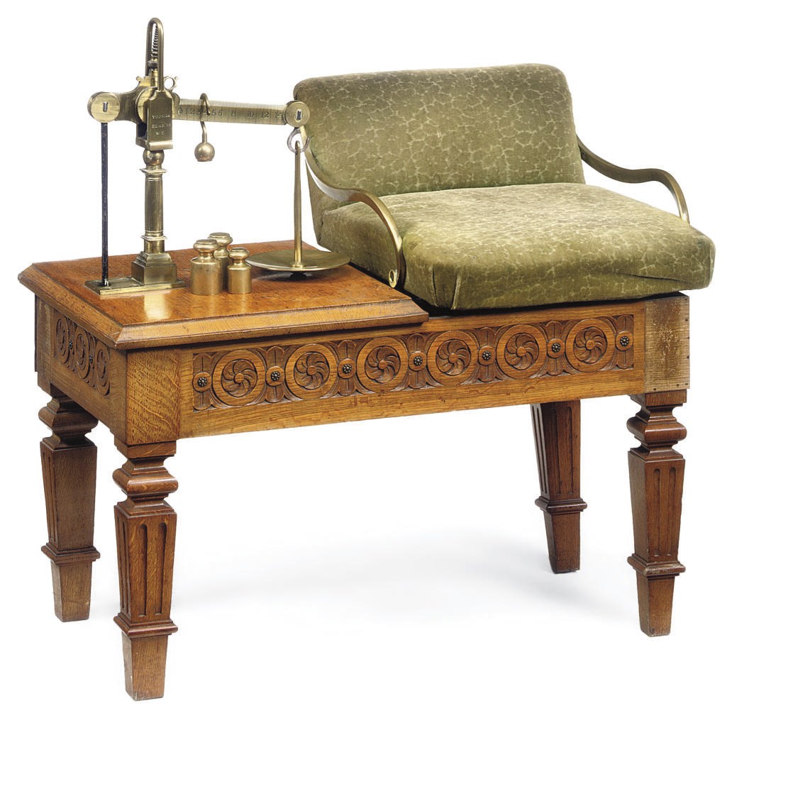 A SET OF VICTORIAN OAK AND BRASS JOCKEY SCALES