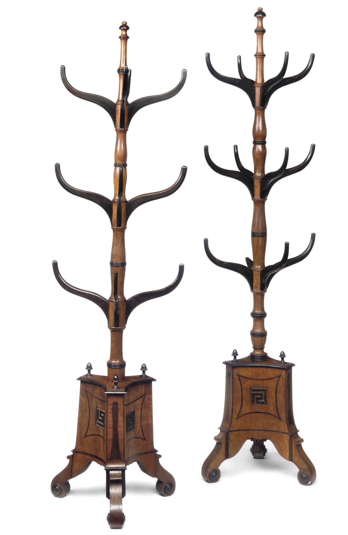 A NEAR PAIR OF REGENCY MAHOGANY AND EBONISED HALL STANDS