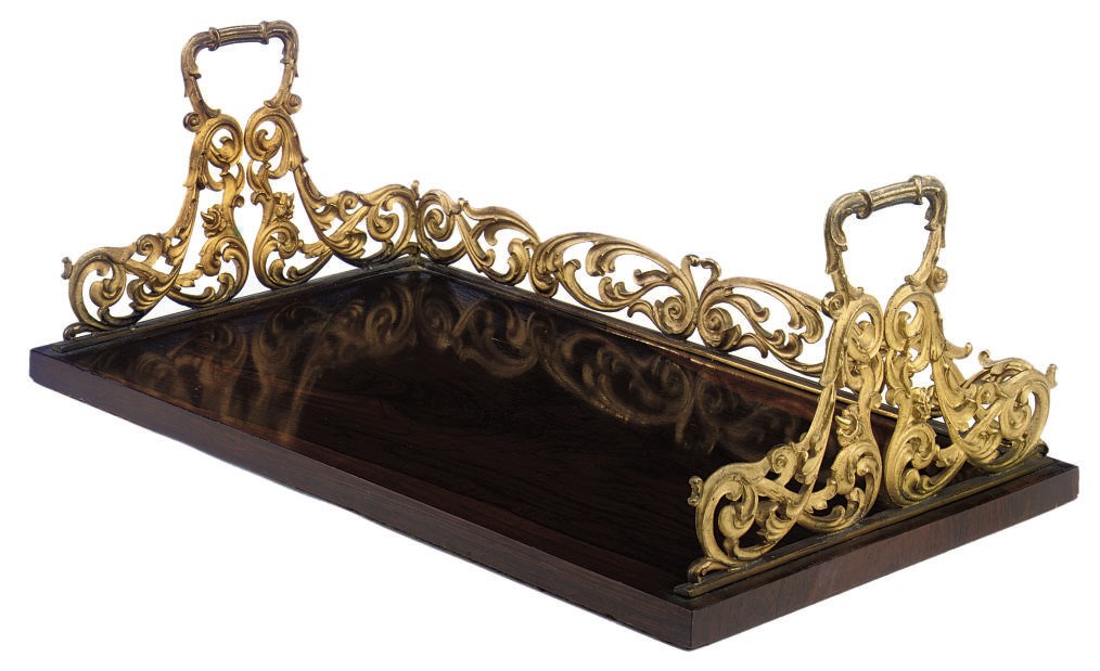 AN EARLY VICTORIAN ROSEWOOD AND GILT-BRASS MOUNTED TABLE TOP BOOK STAND