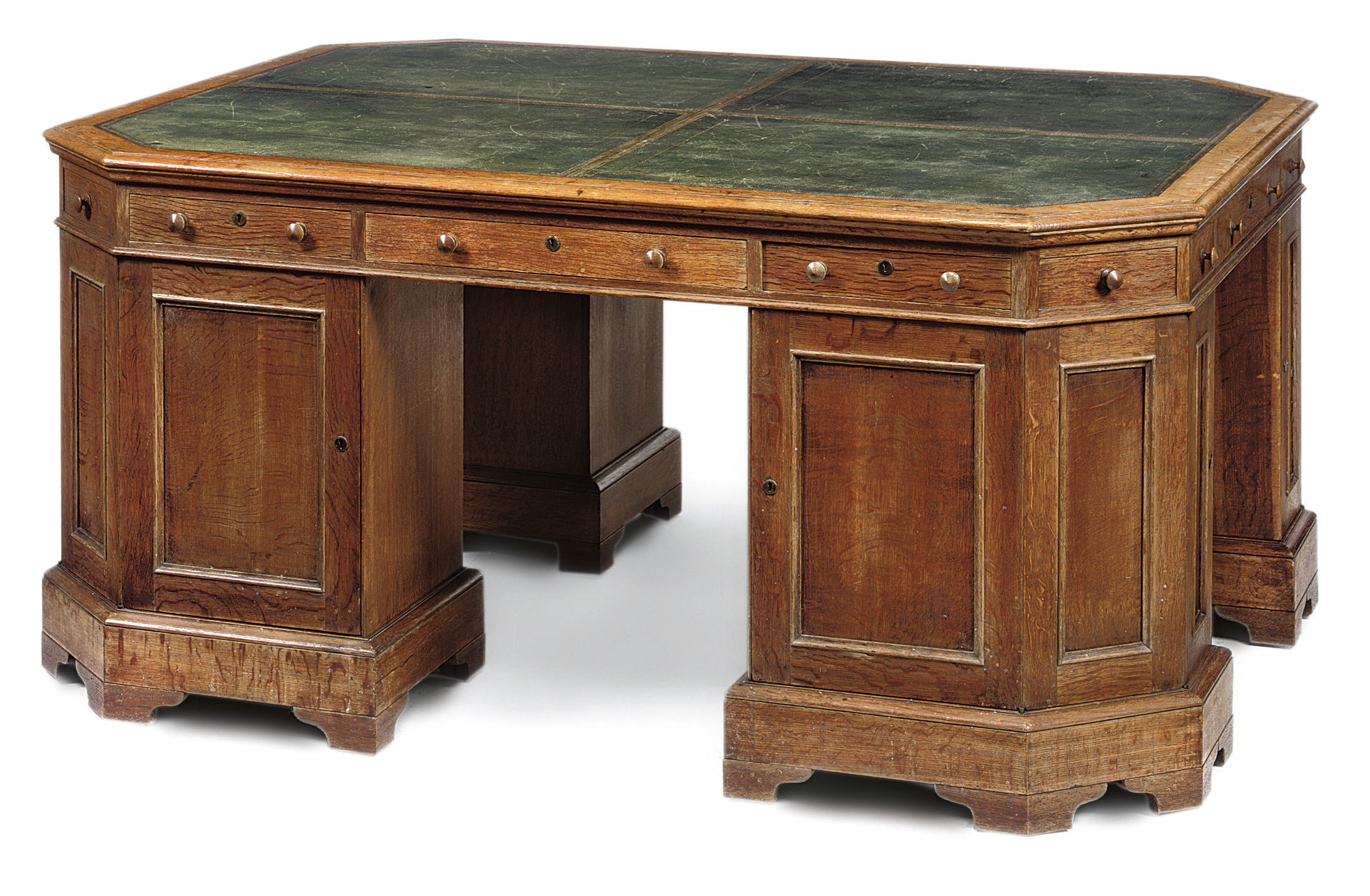 AN EARLY VICTORIAN OAK LIBRARY DESK