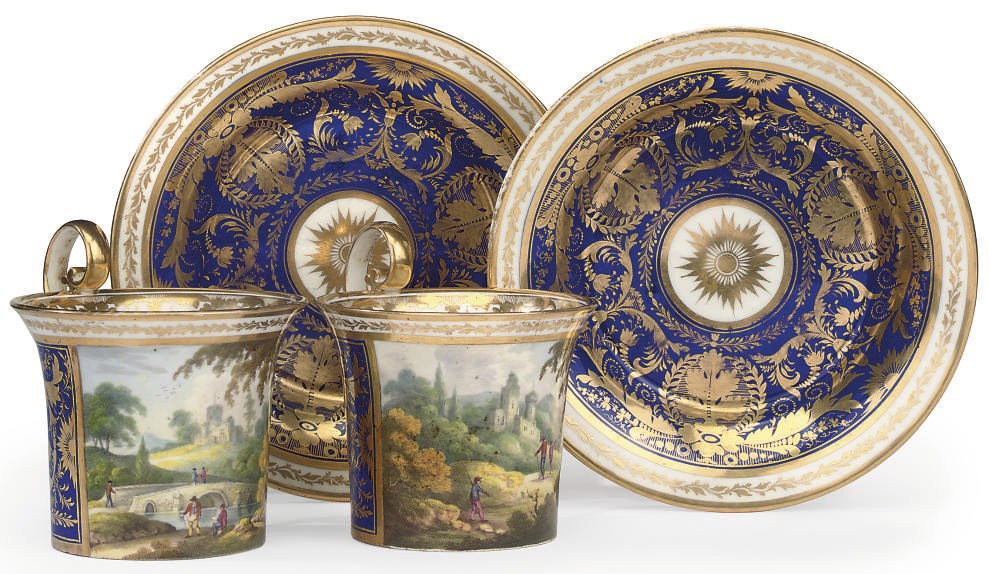 A PAIR OF DERBY PORCELAIN TOPOGRAPHICAL BLUE-GROUND CABINET-CUPS AND SAUCERS