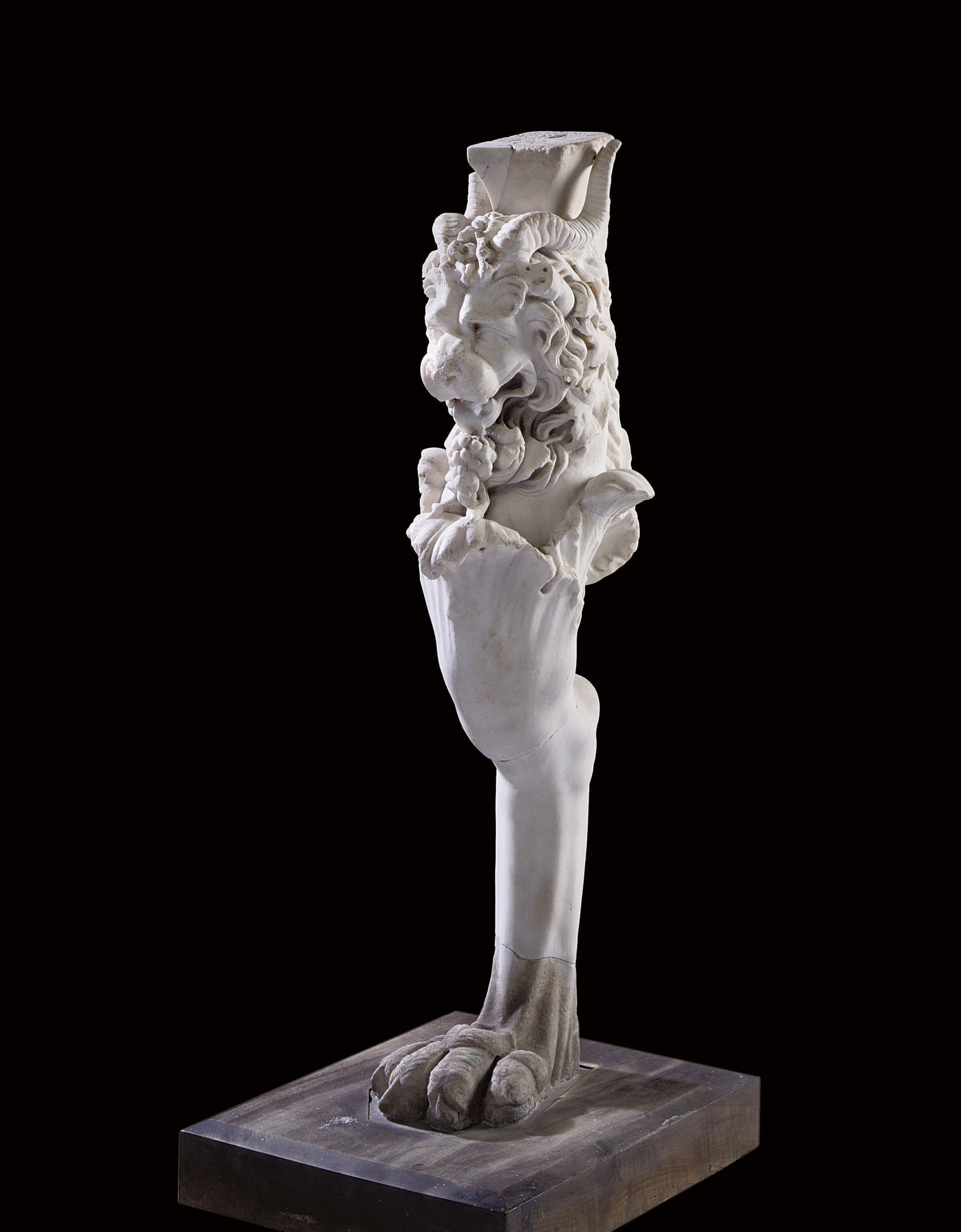 A ROMAN MARBLE TABLE LEG IN THE FORM OF A LION-GRIFFIN