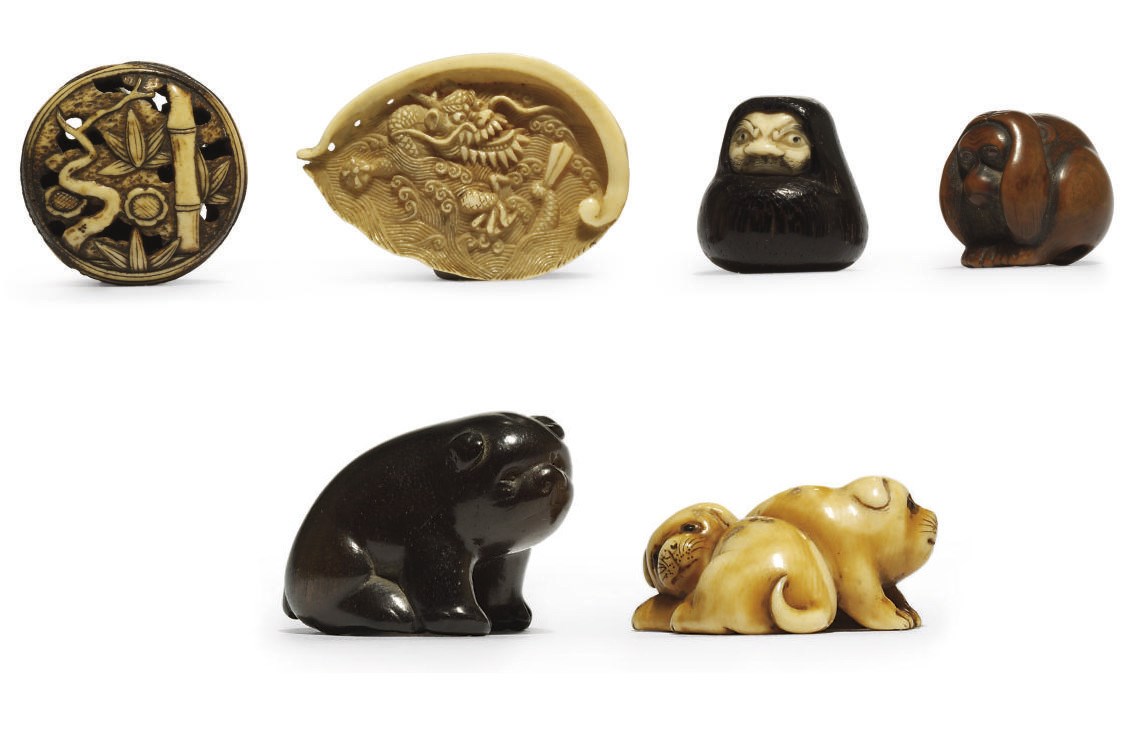 A COLLECTION OF WOOD AND IVORY NETSUKE