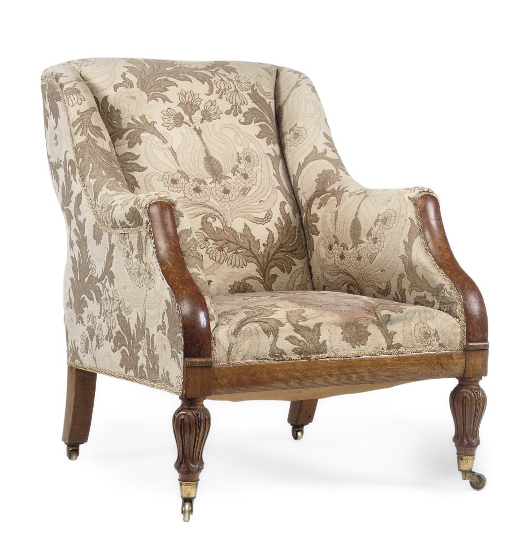 A GEORGE IV BROWN-OAK AND OAK EASY ARMCHAIR