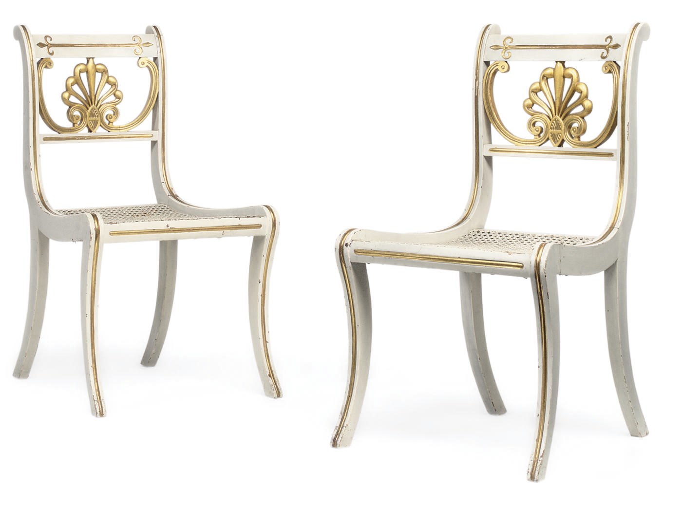 A PAIR OF SCOTTISH GEORGE IV WHITE-PAINTED AND PARCEL-GILT DINING CHAIRS