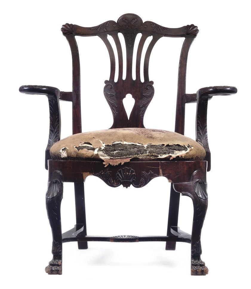 AN IRISH MAHOGANY OPEN ARMCHAIR