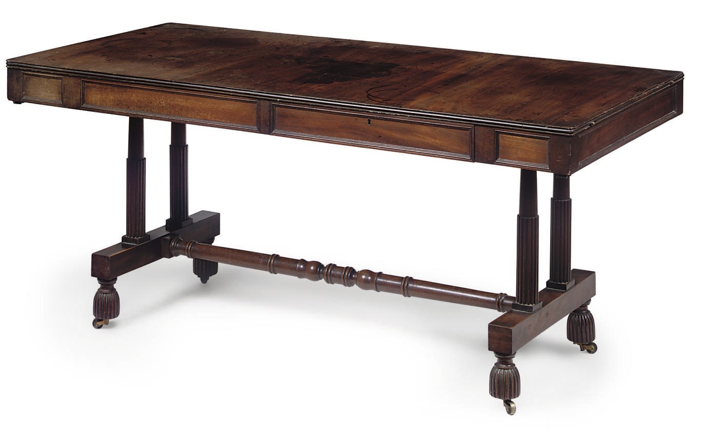 A REGENCY MAHOGANY LIBRARY TABLE