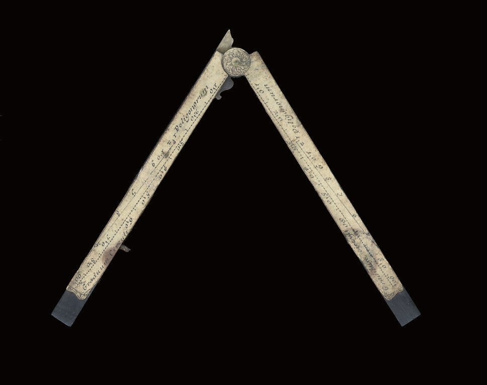 A rare Italian 17th-century paper-on-wood sector