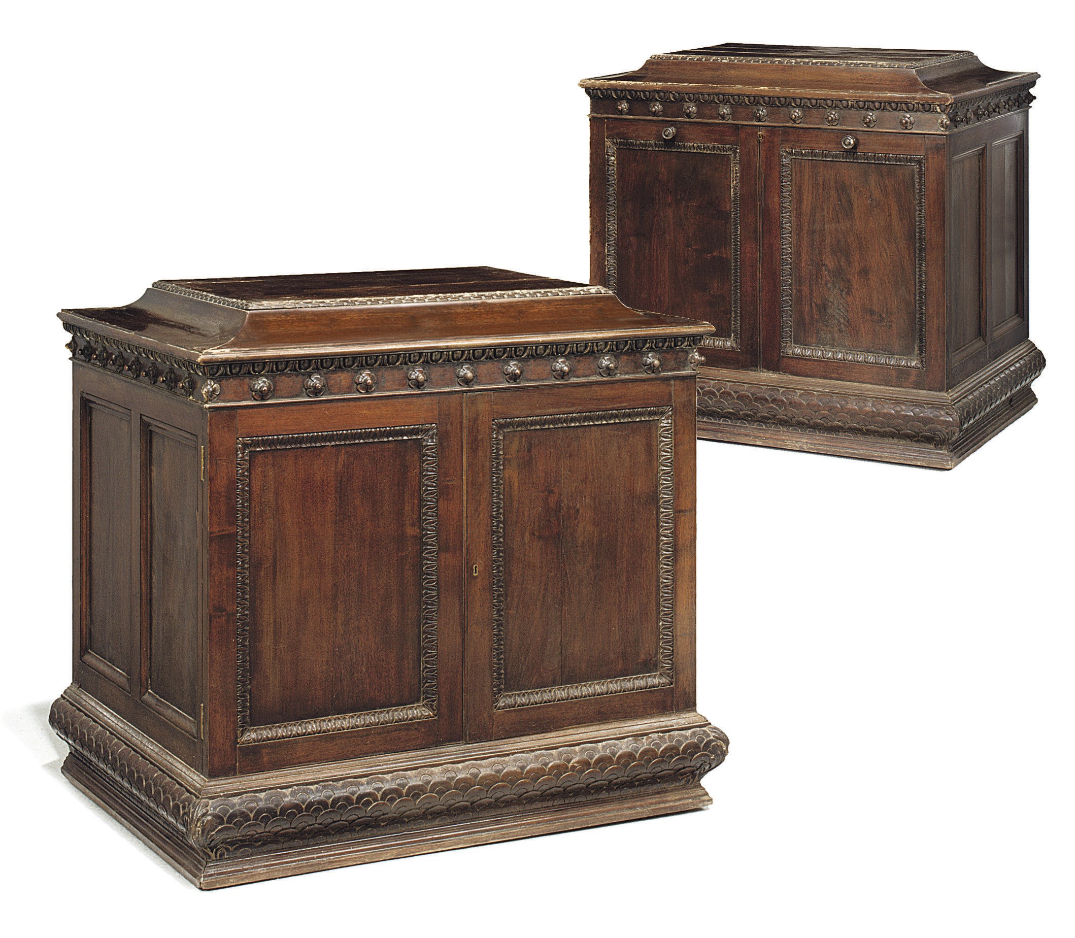 A PAIR OF VICTORIAN WALNUT LIBRARY CUPBOARDS