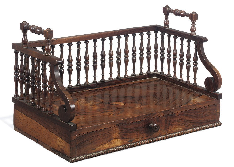 A REGENCY ROSEWOOD DESKTOP BOOKSTAND
