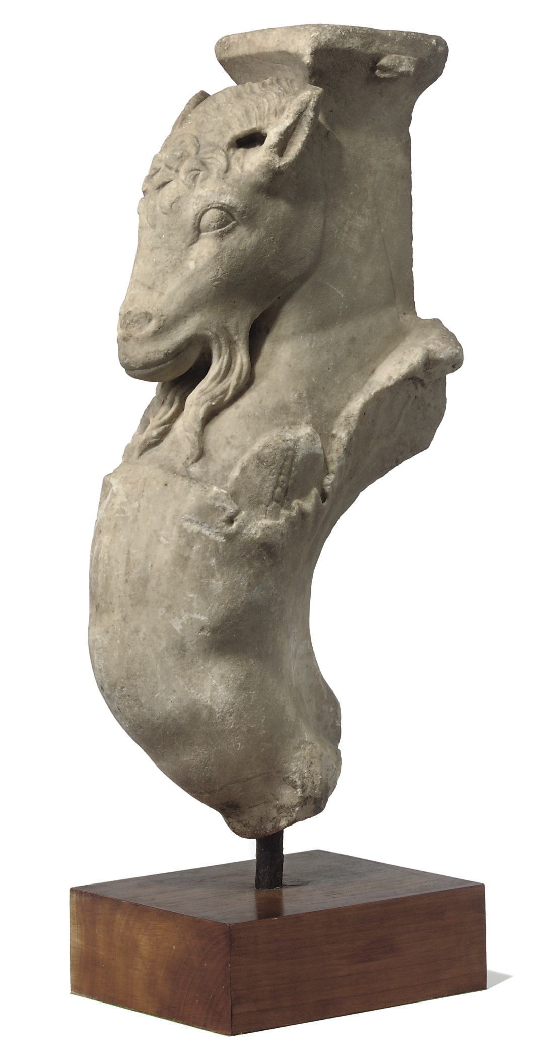 A ROMAN MARBLE TRAPEZOPHOROS (TABLE LEG)