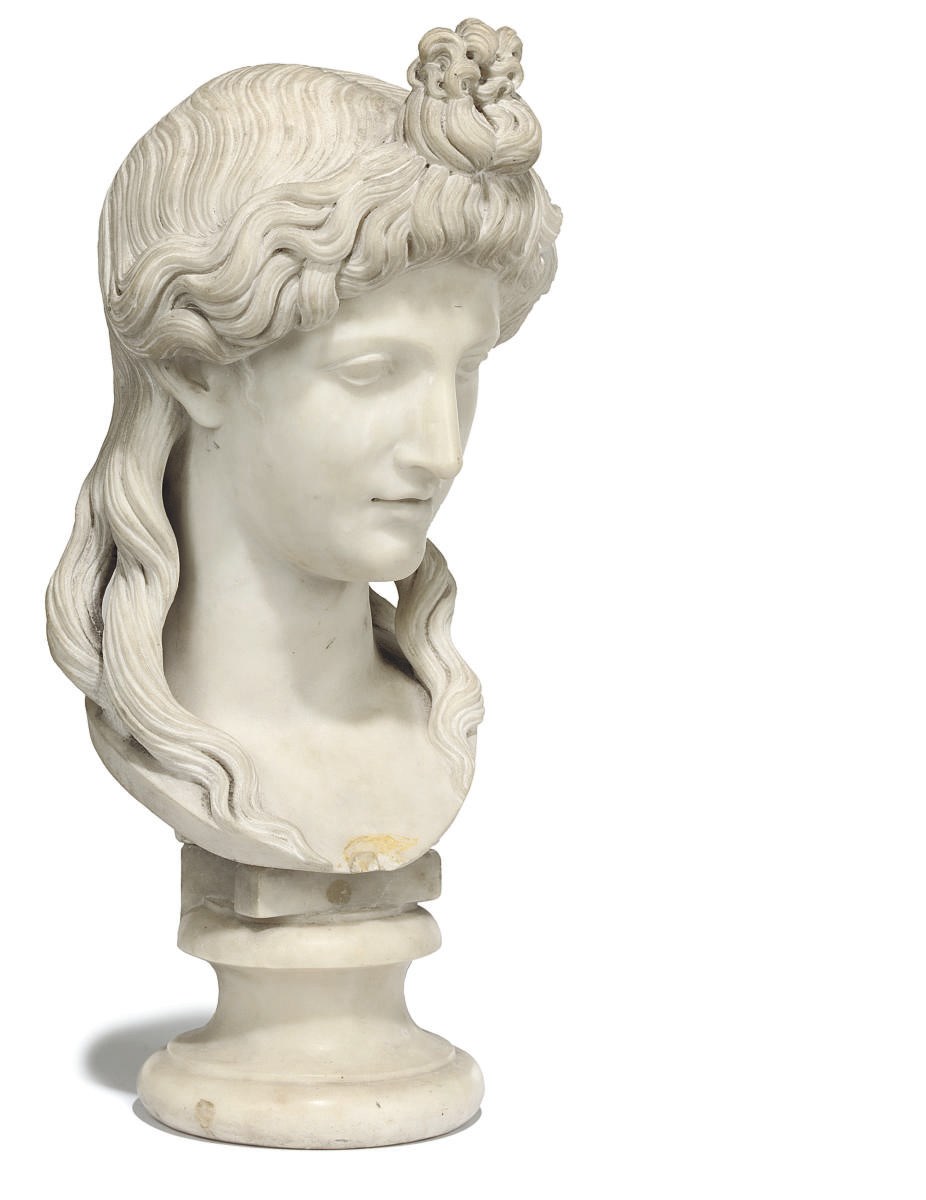 AN ITALIAN WHITE MARBLE BUST OF ISIS
