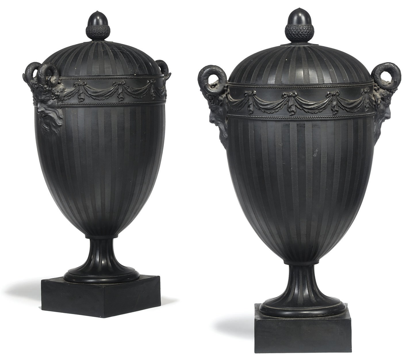A PAIR OF WEDGWOOD & BENTLEY BLACK BASALT VASES AND COVERS
