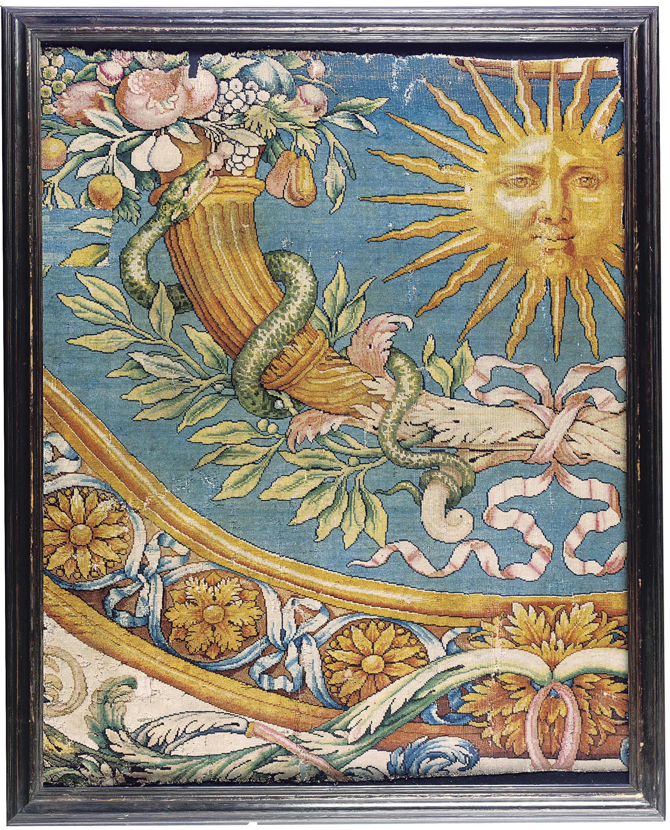A LOUIS XIV SAVONNERIE CARPET FRAGMENT