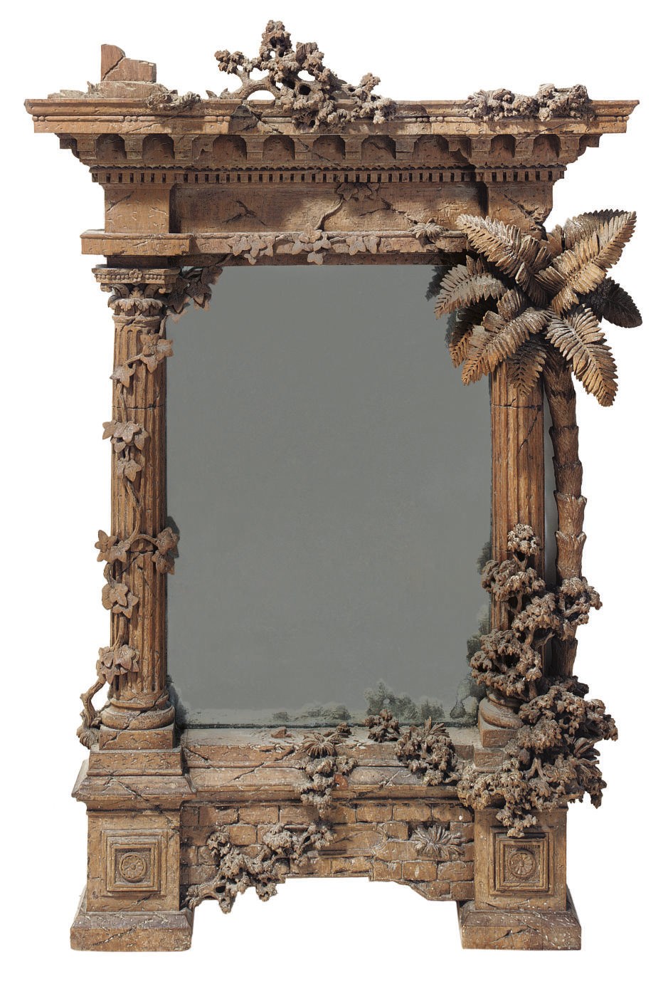 A CARVED WALNUT MIRROR MODELLED AS A CLASSICAL RUIN