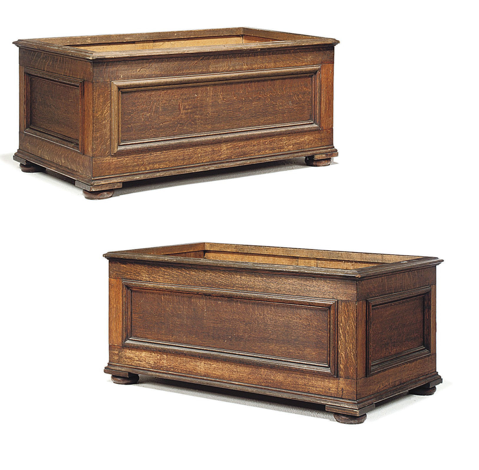A PAIR OF GEORGE IV OAK LOG BASKETS