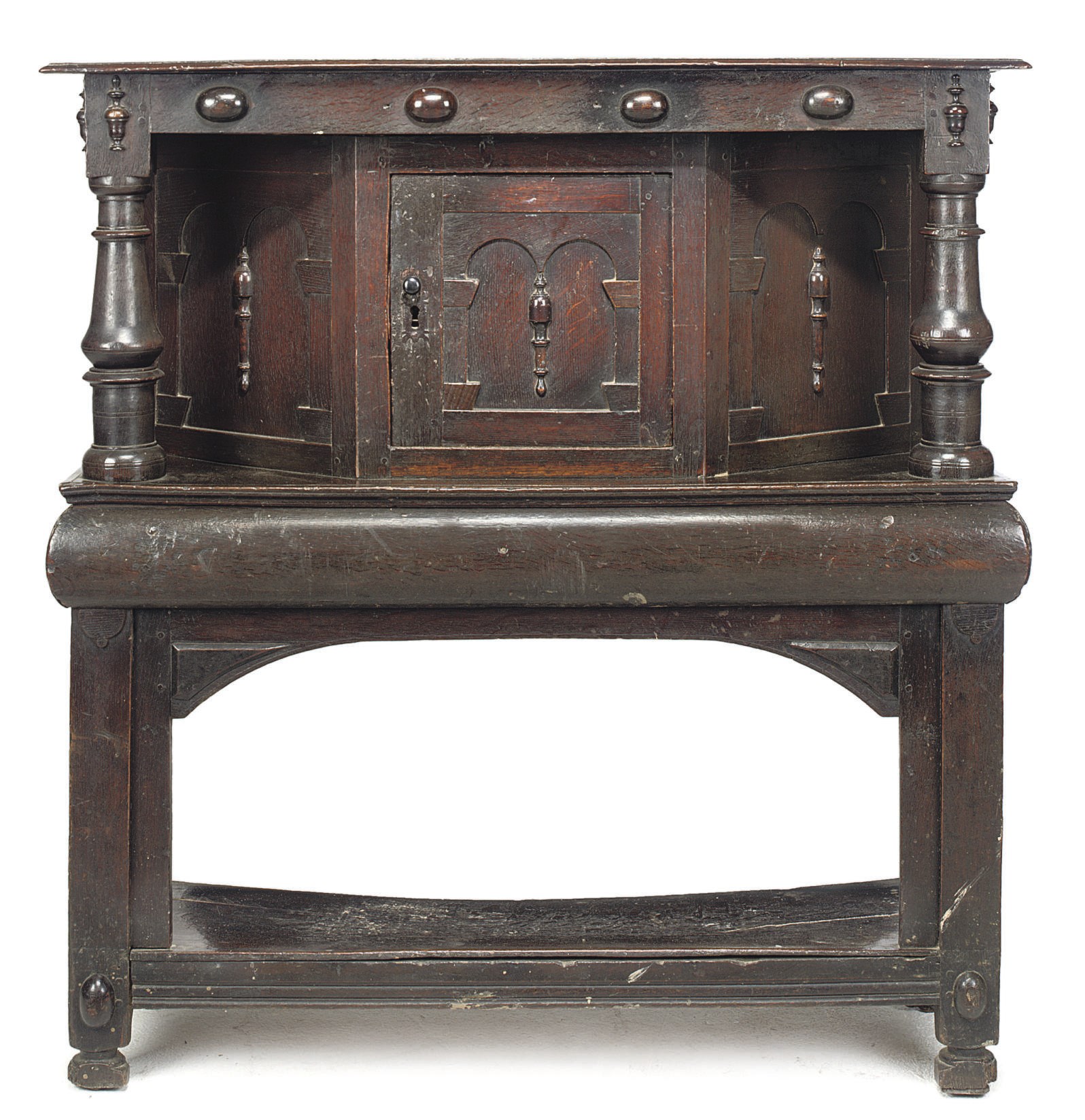 AN ENGLISH OAK COURT CUPBOARD