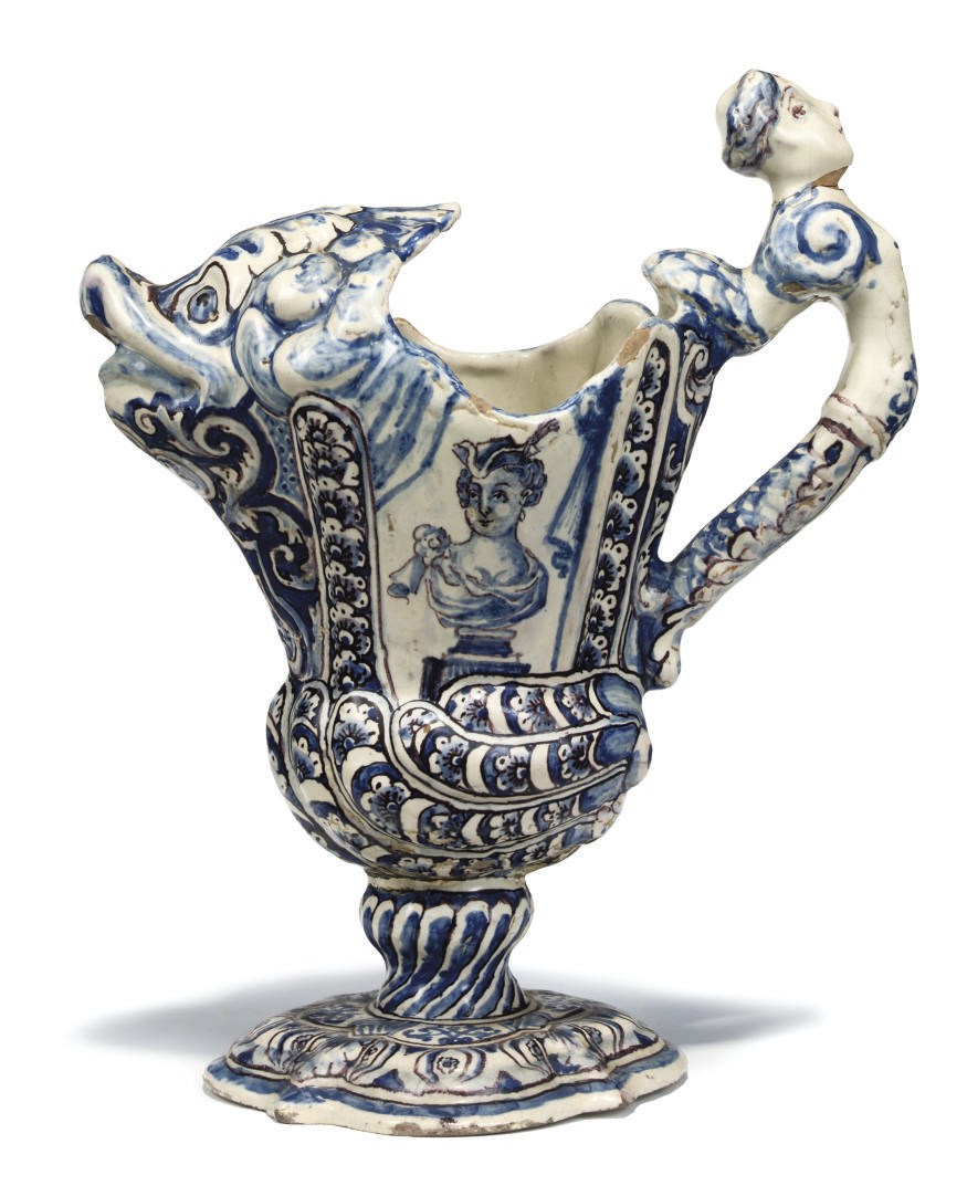 A CONTINENTAL FAIENCE BLUE AND WHITE EWER