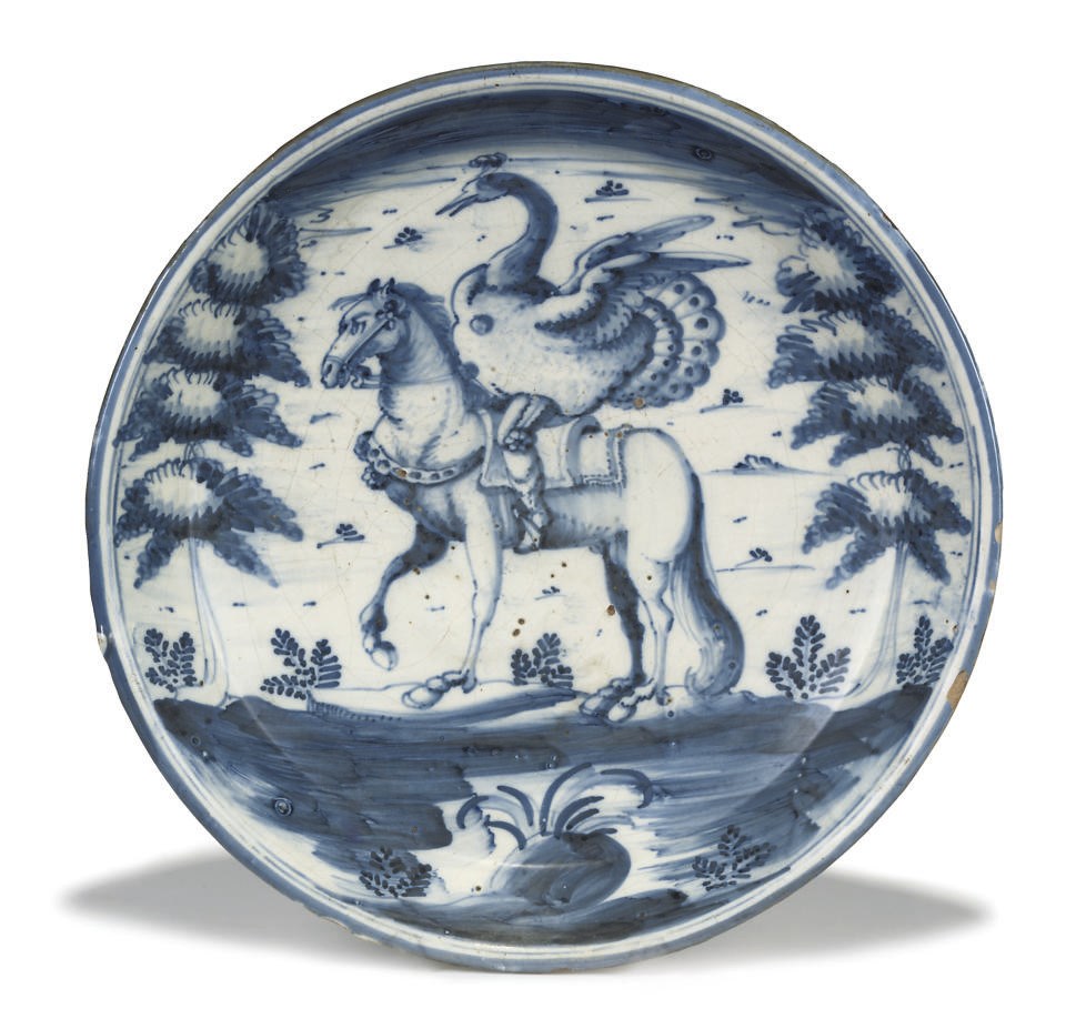 A SPANISH FAIENCE BLUE AND WHITE CHARGER