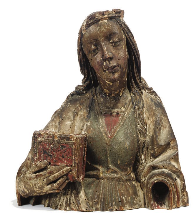 A SOUTH GERMAN POLYCHROME CARVED WOOD HALF-LENGTH FIGURE OF A FEMALE SAINT