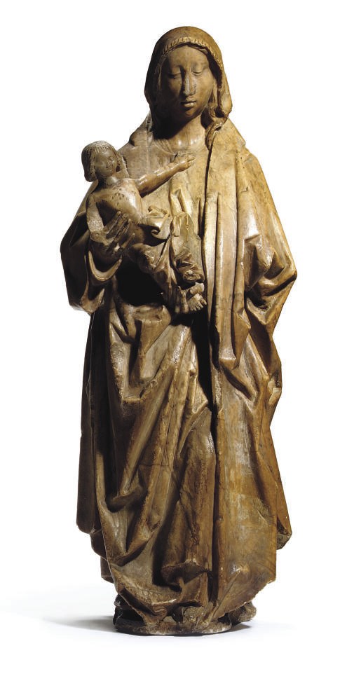 A CARVED ALABASTER GROUP OF THE VIRGIN AND CHILD