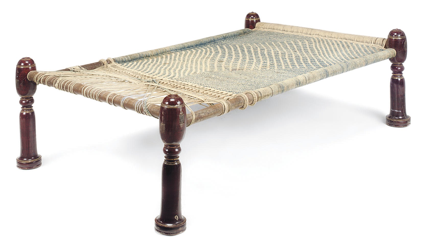 AN INDIAN RED-PAINTED HARDWOOD BED