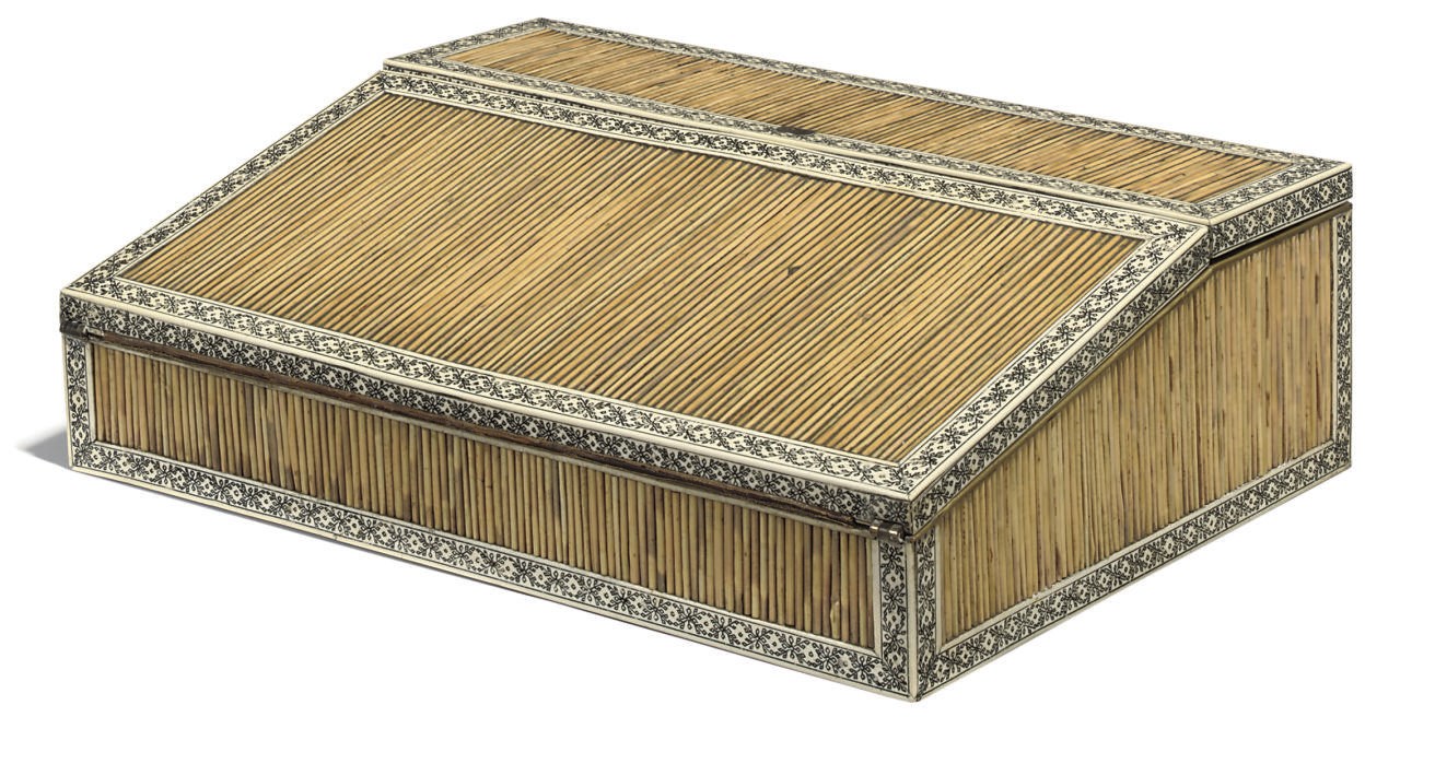 AN ANGLO-INDIAN ENGRAVED IVORY AND PORCUPINE QUILL WRITING SLOPE