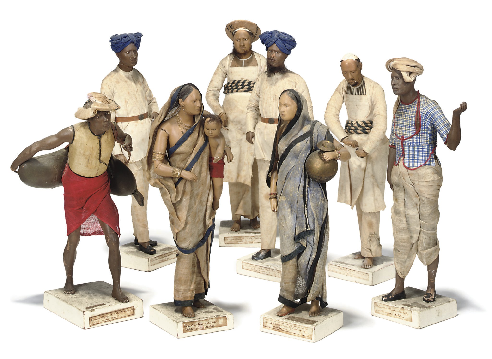 A GROUP OF EIGHT INDIAN BENGALI TERRACOTTA FIGURES OF SERVANTS
