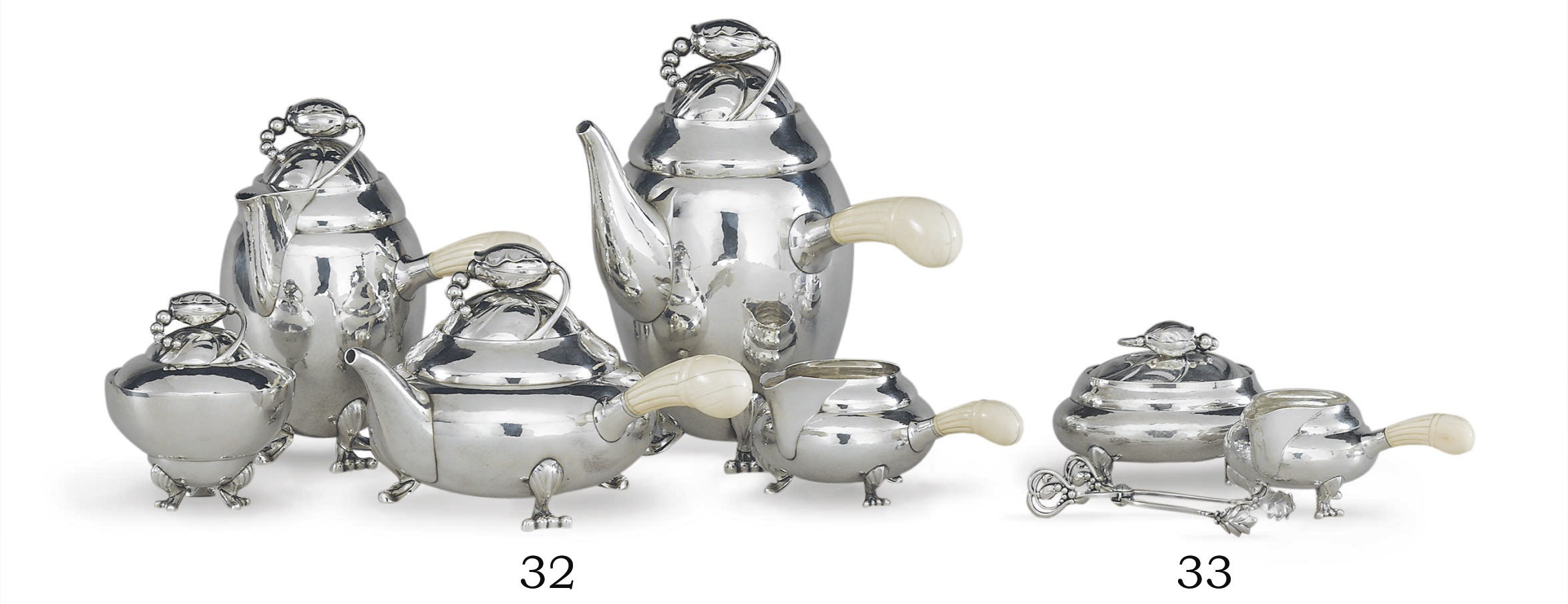 A DANISH SILVER SUGAR BOX, CREAM JUG AND PAIR OF SUGAR TONGS DESIGNED BY GEORG JENSEN**