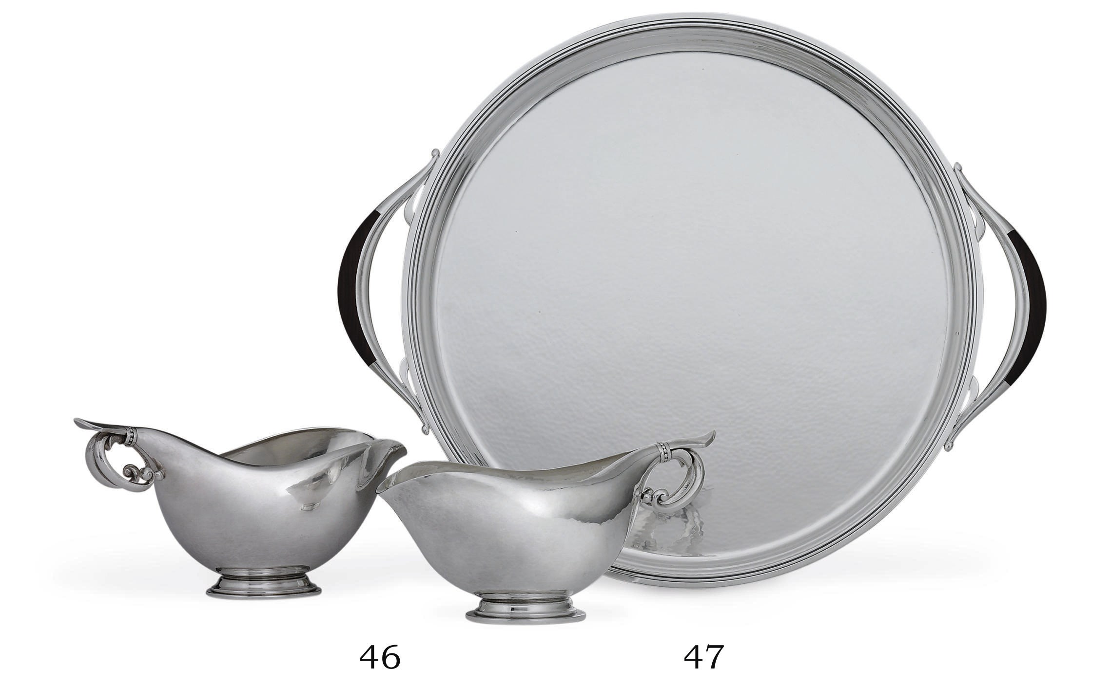 A DANISH SILVER TWO-HANDLED TRAY DESIGNED BY HARALD NIELSEN