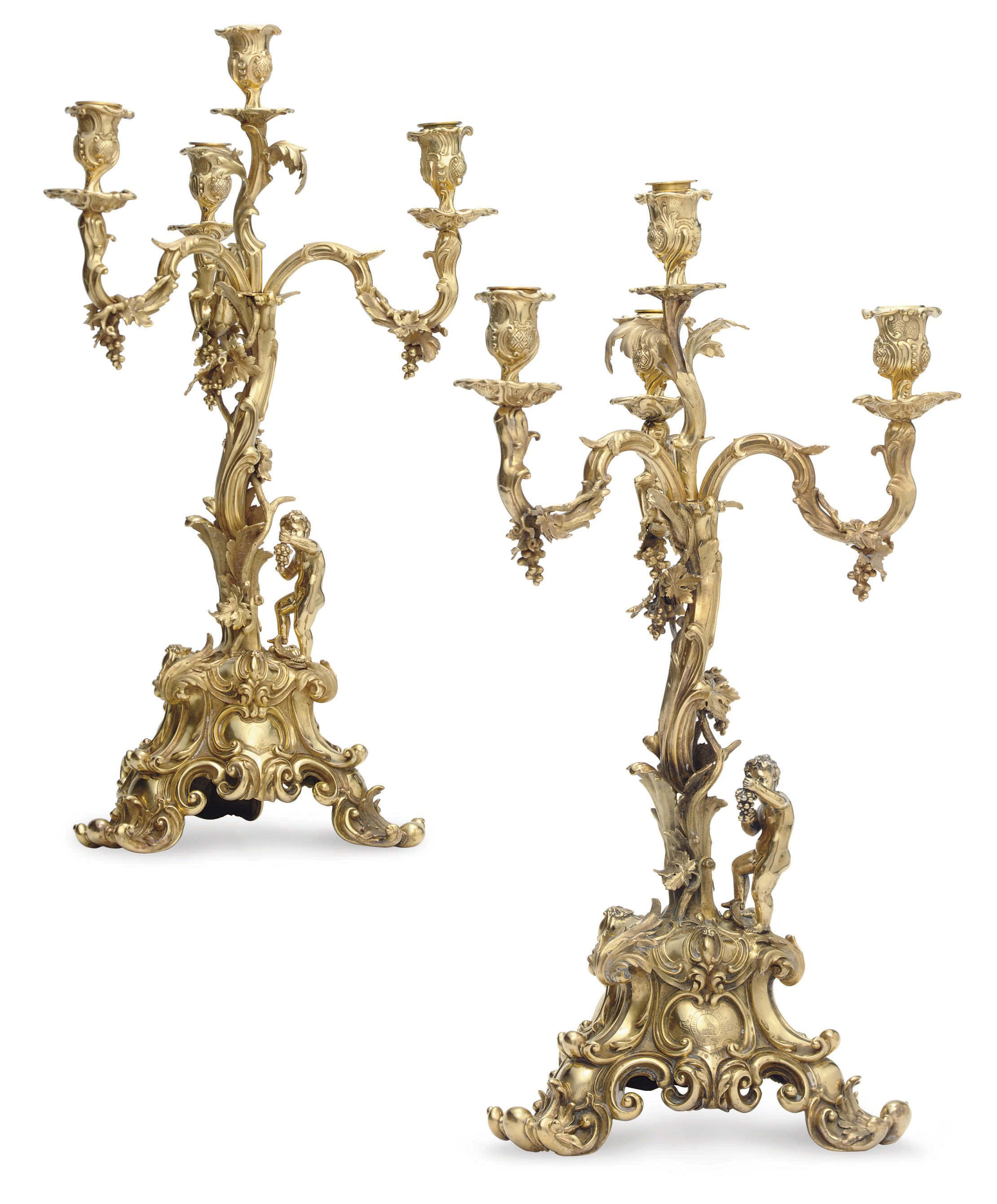 A PAIR OF VICTORIAN SILVER-GILT FOUR-LIGHT CANDELABRA