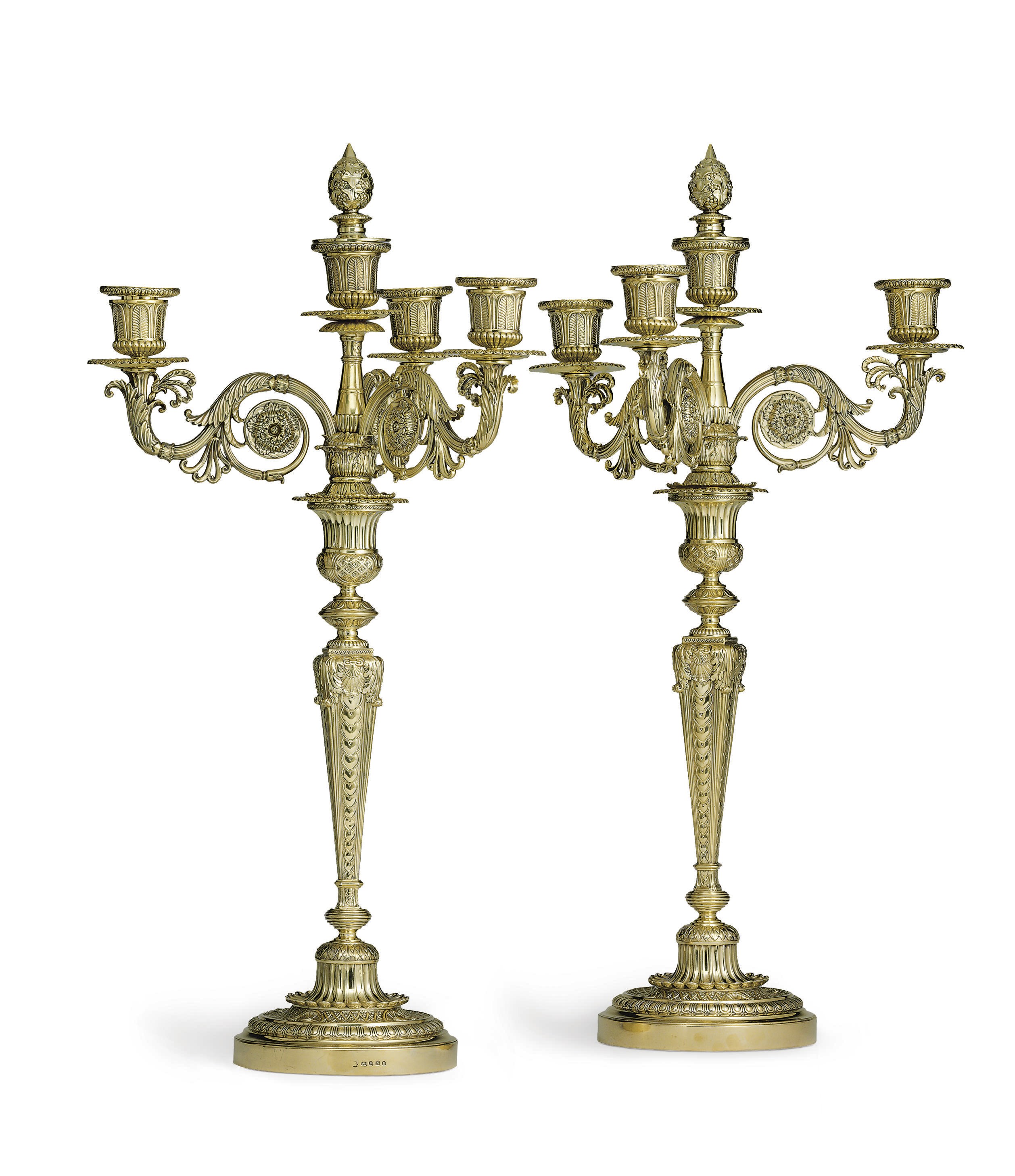 A MAGNIFICENT PAIR OF GEORGE III SILVER-GILT FOUR-LIGHT CANDELABRA
