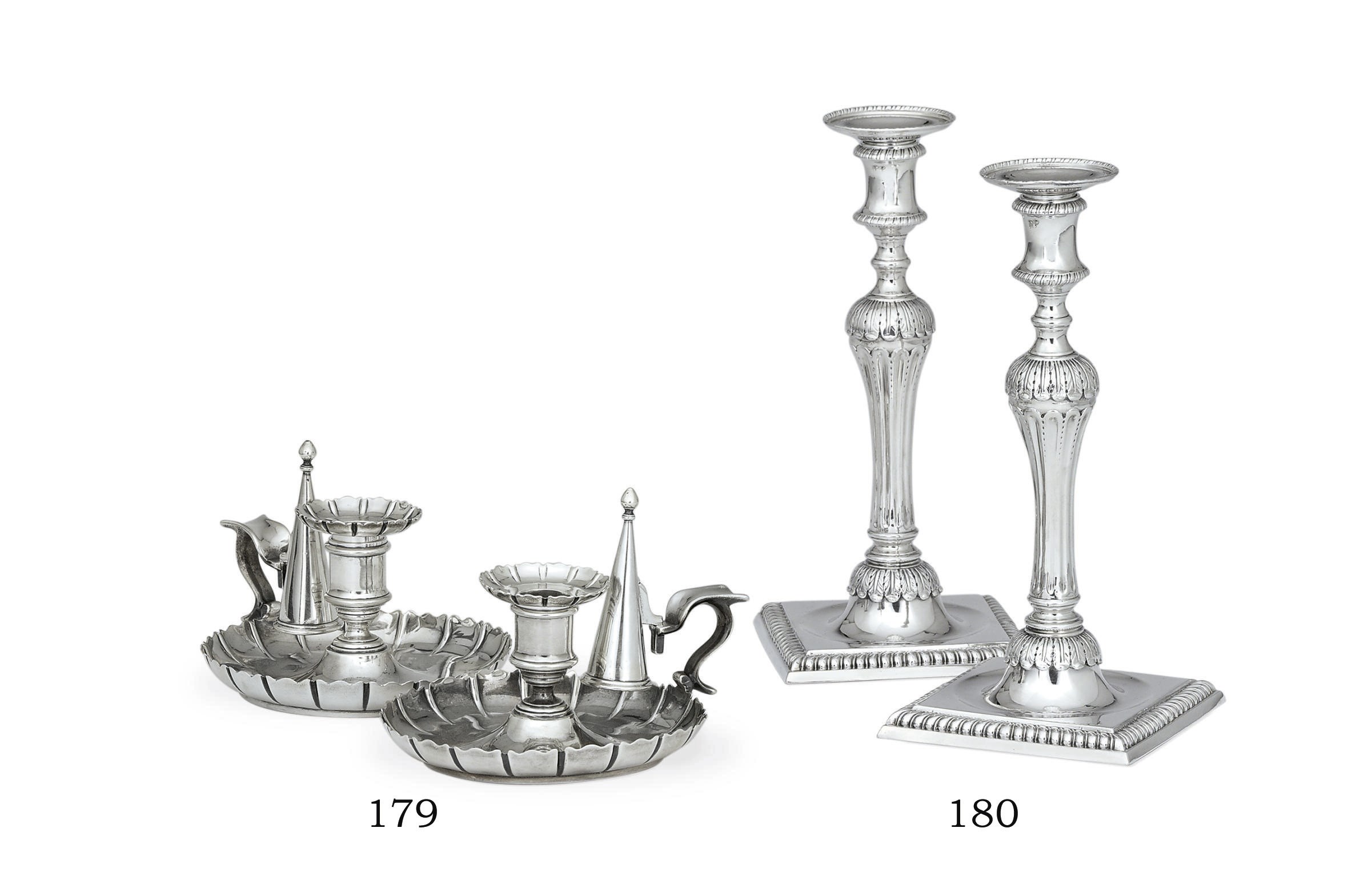 A PAIR OF VICTORIAN SILVER CHAMBERSTICKS