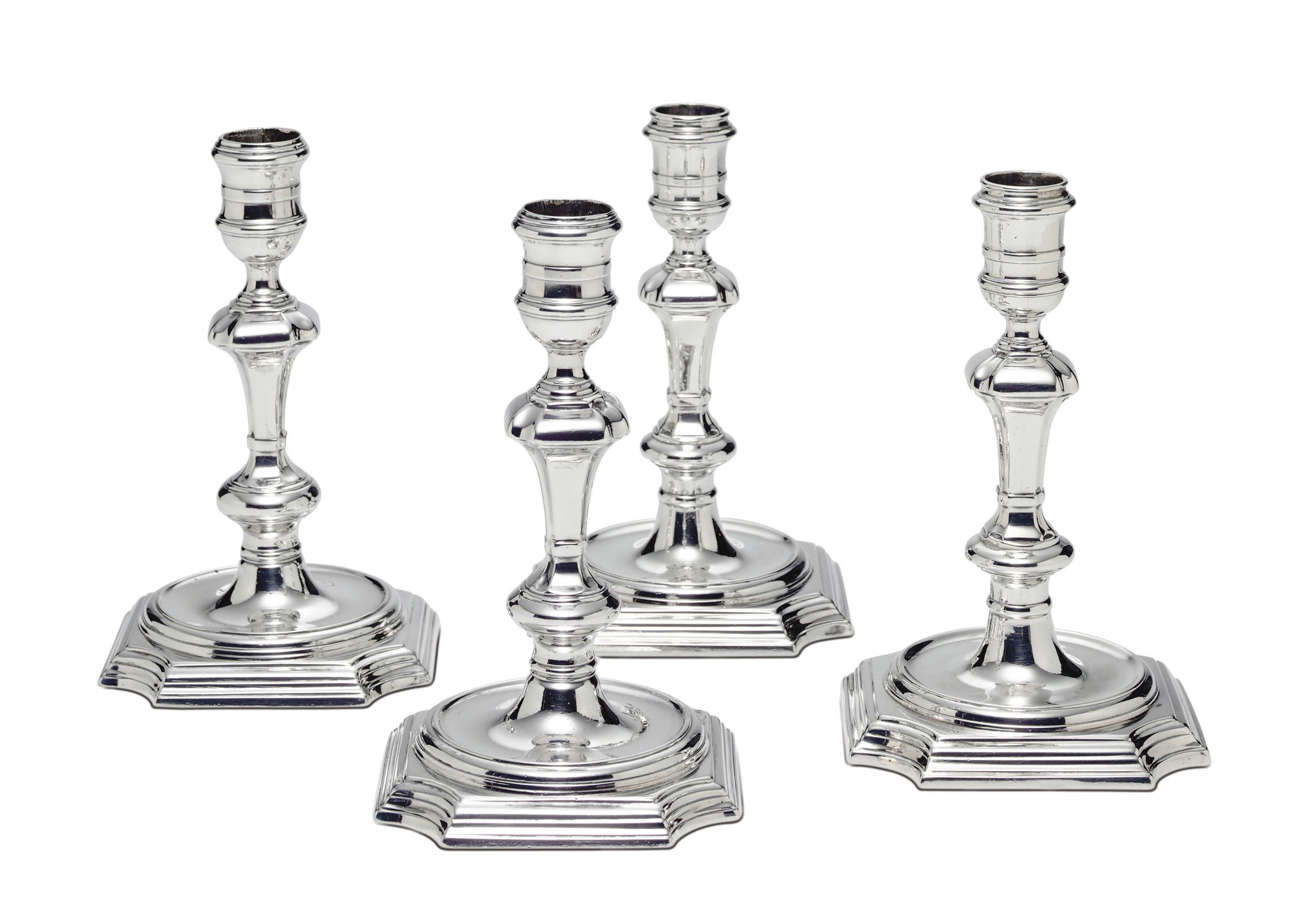 TWO PAIRS OF GEORGE II SILVER CANDLESTICKS